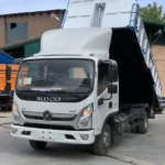 کامیونت دیما با باری کمپرسی